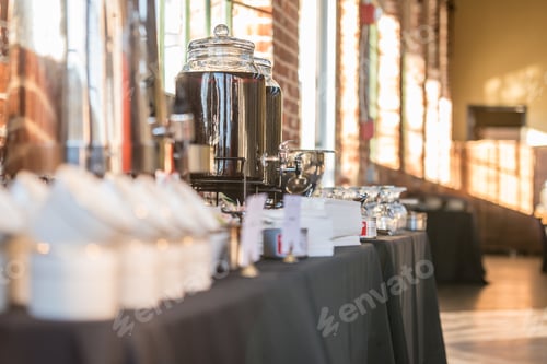 Preview: Coffee urn on the table in the hall with a blurred background