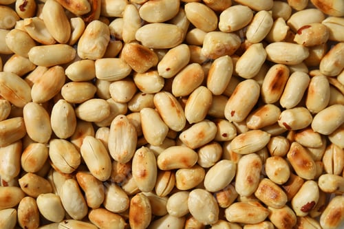 Preview: Many roasted peanuts as background, top view