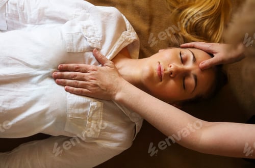 Preview: Young woman having massage treatment