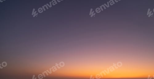 Preview: Sunset sky. Abstract nature background. Dramatic blue and orange, colorful clouds at twilight time.