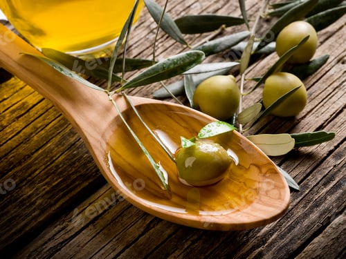 Preview: olive oil over wood spoon