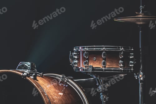 Preview: Part of a drum kit, drums on a dark background, copy space.