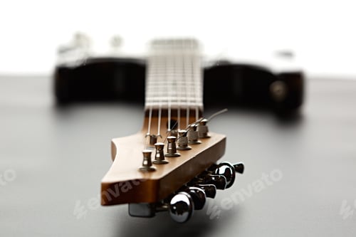 Preview: Electric guitar, fosuc view on head, closeup