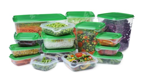 Preview: Plastic containers with fresh food on white background
