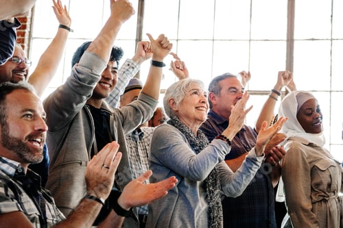 Preview: Diverse people clapping after a session