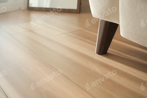 Preview: Soft sunlight illuminating a cozy living room with wooden flooring