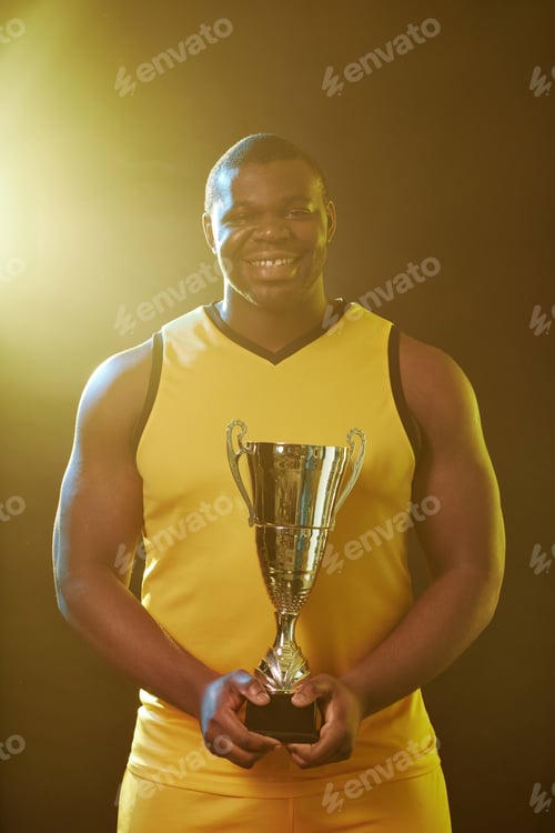 Preview: Muscular Sportsman Smiling At Camera Celebrating Victory