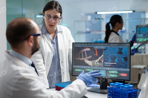 Preview: Scientist team discussing coronavirus discovery analyzing biomedical expertise