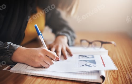 Preview: Cropped shot of an unrecognizable female university student in class