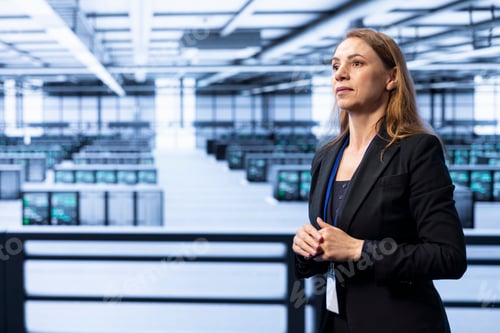 Preview: Employee in server hub using augmented reality to monitor energy consumption