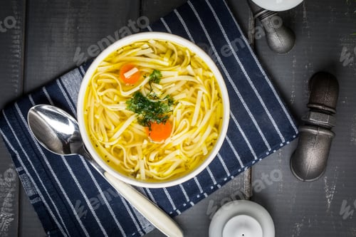 Preview: Tasty meat broth with noodles.