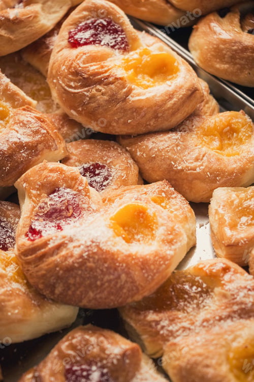 Preview: Vertical closeup shot of delicious freshly baked desserts