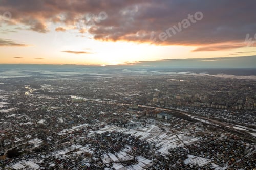 Preview: Top view of city suburbs or small town nice houses on winter morning