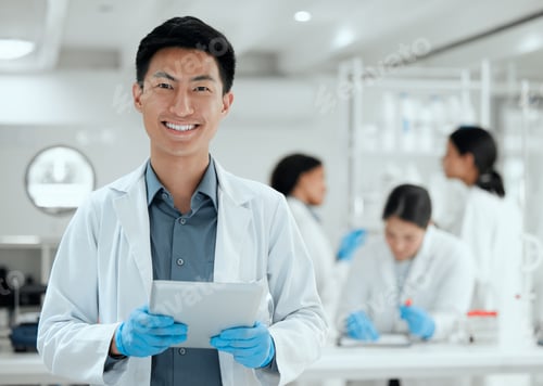 Preview: Delving into the world of tech and science. Shot of a young scientist using a digital tablet.