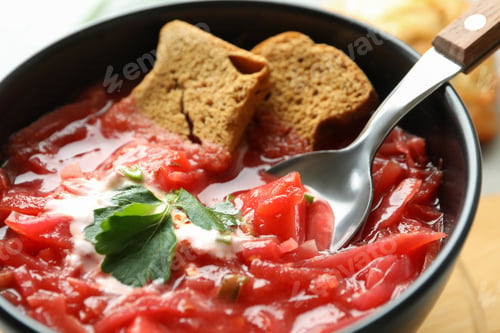 Preview: Bowl of tasty beetroot soup, close up