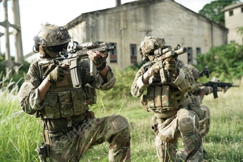 Preview: Soldier in full US MARSOC armed with assault rifle run through the abandoned building. Military