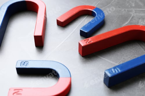 Preview: Red and blue horseshoe magnets on grey background