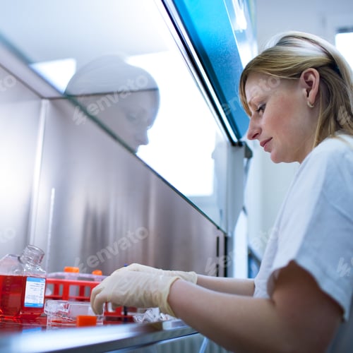 Preview: portrait of a female researcher doing research in a lab (color t