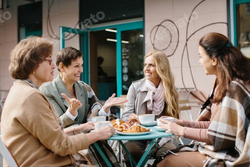 Preview: Beautiful senior women relaxing in a cafe.