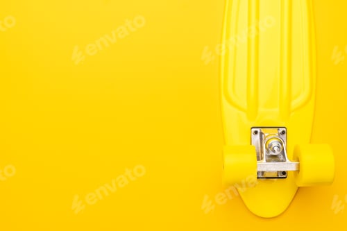Preview: Skateboard On Yellow Background