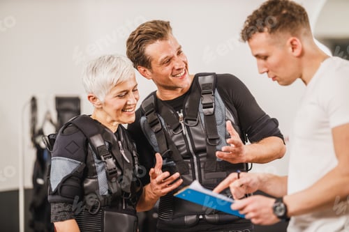 Preview: Couple Talking With Coach before EMS Training
