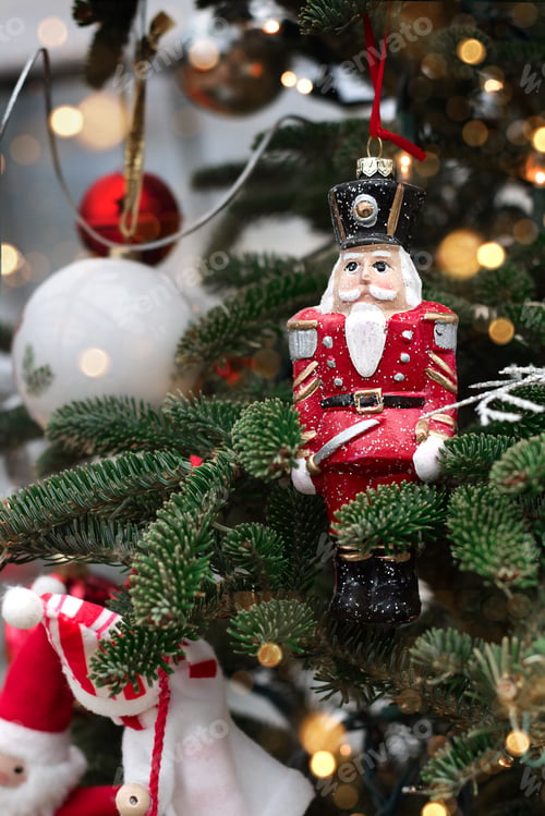 Preview: Nutcracker Christmas ornament hanging on Christmas tree