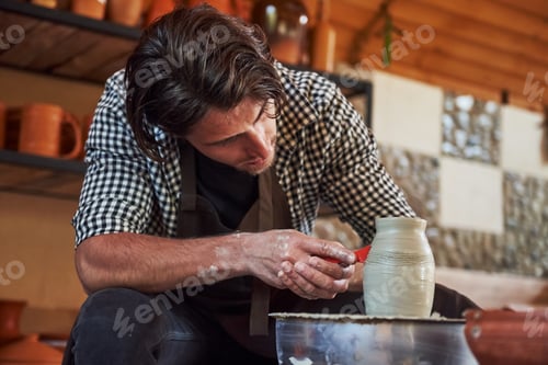 Preview: Makes lines with tool. Ceramist uses potter's wheel and creates a handmade clay product