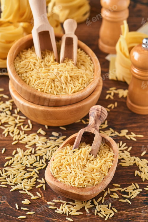 Preview: Ptititm or israeli couscous - kind of small pasta, traditional for israelian cuisine on an old woode