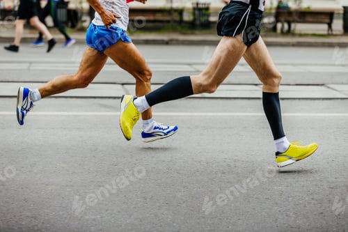 Preview: legs of two men runners