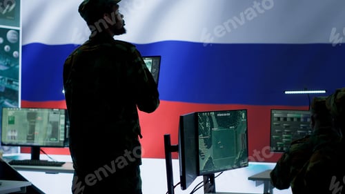 Preview: Soldiers Working Diligently at Computers in Control Room