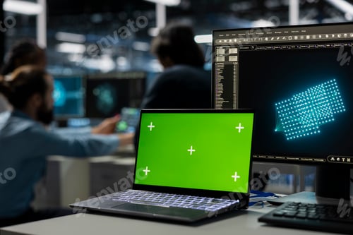 Preview: Green screen laptop used by developers in data center using AI LLM assistant