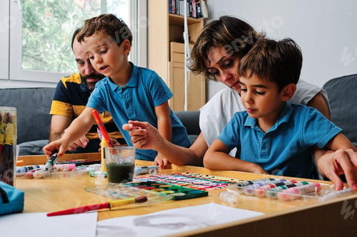 Preview: a family painting and playing with their kids