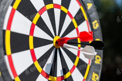 Preview: Right on target concept using dart in the bullseye on dartboard