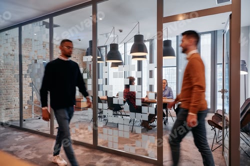 Preview: In the dynamic hustle and bustle of a business environment, a group of young business professionals