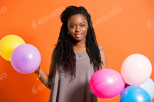 Preview: Young woman with balloons