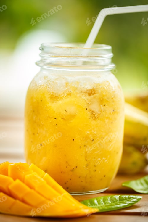 Preview: Smoothies mango and banana in a glass jar