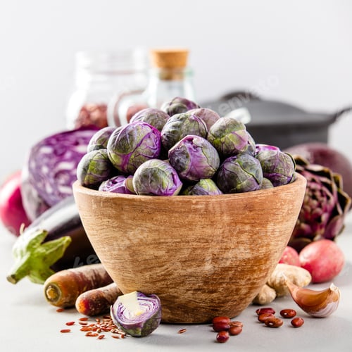 Preview: Purple Brussels sprouts in a wooden bowl