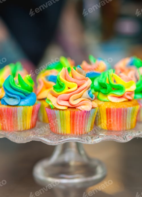 Preview: Colorful cupcakes with rainbow cream.