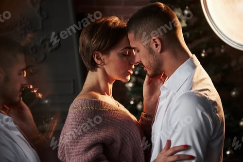 Preview: Closeness of the guy and girl in luxury wear that dancing and flirting