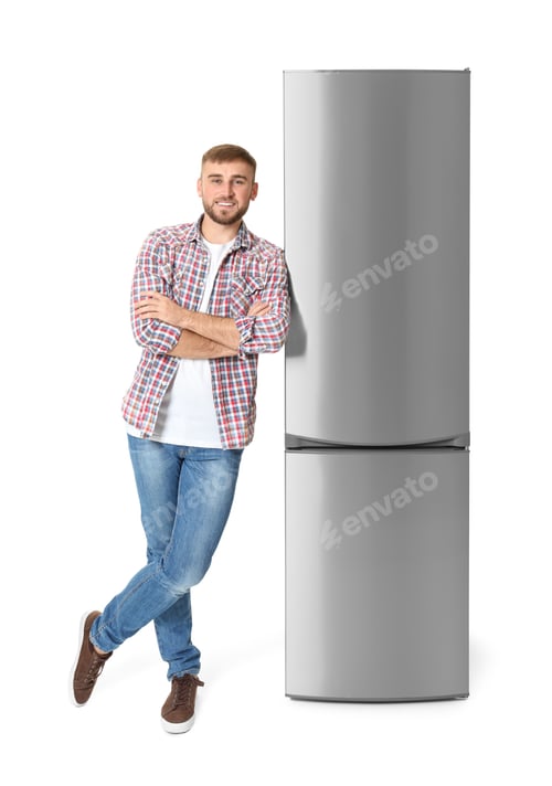 Preview: Young man near closed refrigerator on white background
