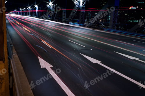 Preview: Long exposure shot of illuminated bridge at night