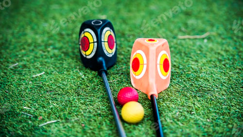 Preview: golf clubs on a grass
