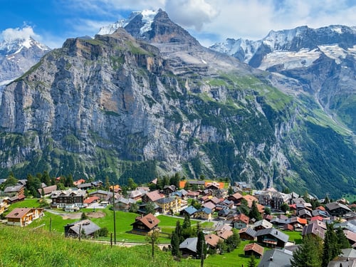 Preview: Swiss alpine village in the mountains in Switzerland. Beautiful landscape.