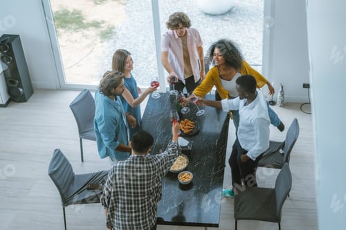 Preview: Lively, diverse friend reunion. Laughter, stories, bonding, music, dance, joyful atmosphere.