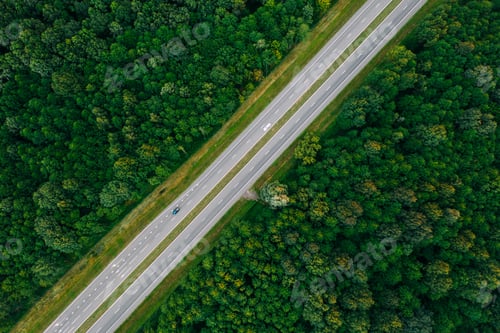 Preview: Aerial View Of Highway Road Through Green Forest Landscape In Su