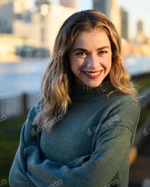 Preview: A vertical closeup shot of a young beautiful blonde female smiling and posing