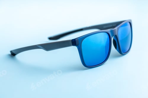 Preview: fashion sunglasses on blue background.