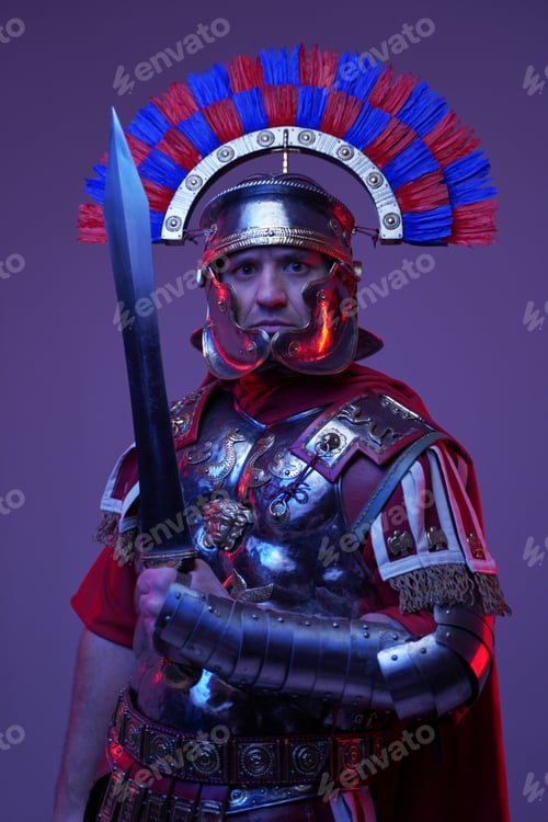 Preview: Shot of ancient roman soldier posing in colorful dark light