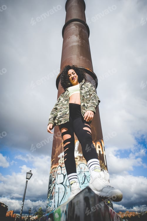 Preview: African American woman laughing in an urban environment