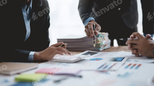 Preview: Business Professionals Analyzing Data During a Meeting